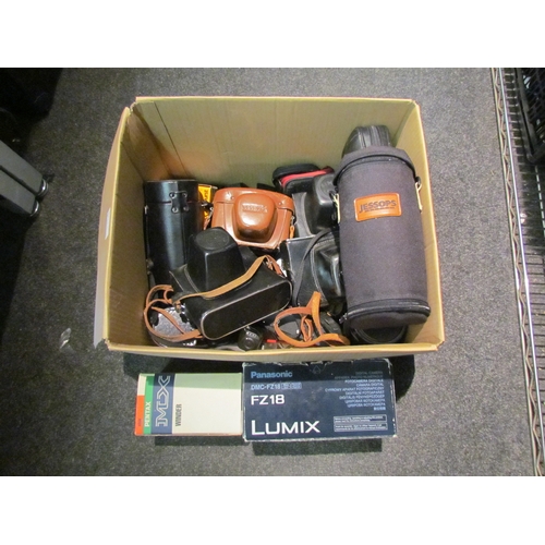 5121 - A box of assorted camera gear including a Lumix DMC-FZ18