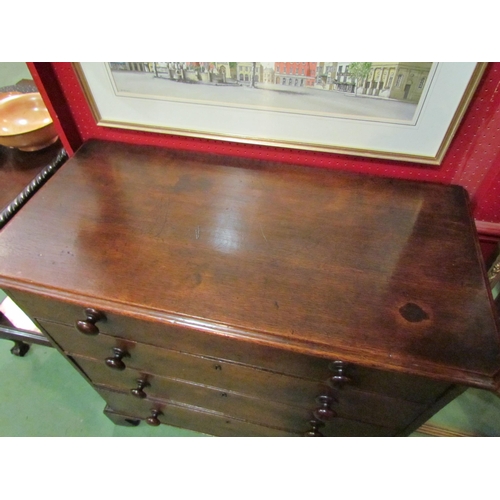 4110 - A 19th Century canted corner oak chest of four graduated long drawers with turned bun handles over b... 