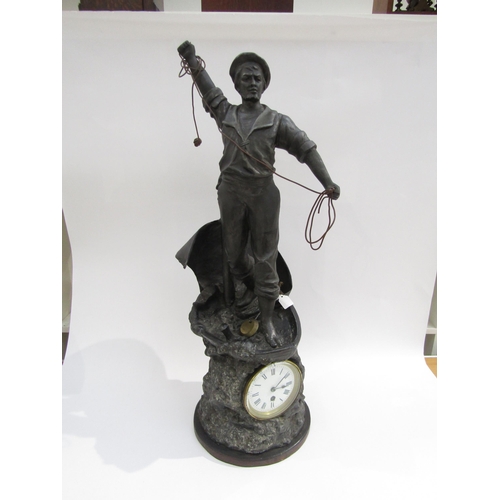 4211 - A large figural timepiece 'Sounding the Depth', spelter figure of a sailor casting a plumb line (wit... 