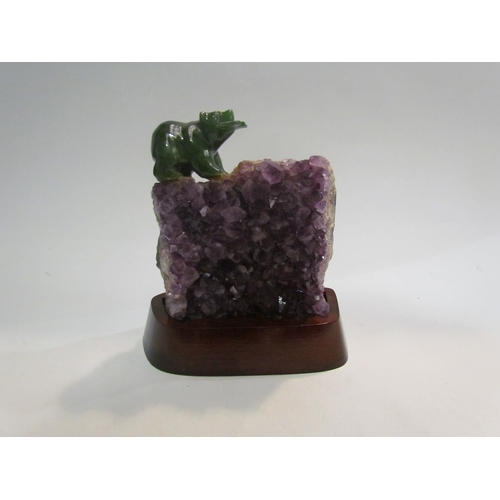 4501 - A Canadian amethyst sculpture with a polar bear, 17cm total with stand