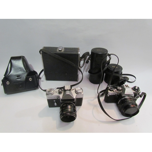 4509 - A Zenit-E camera, Olympus camera cine camera and two lenses etc