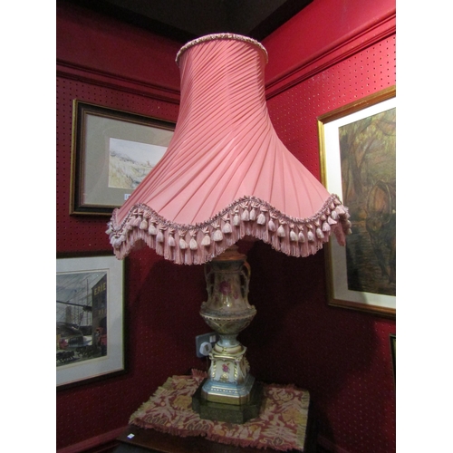 4039 - A pair of oversized china table lamps, floral patterns, enriched with gilt, silk tasselled shades