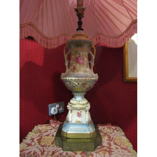 4039 - A pair of oversized china table lamps, floral patterns, enriched with gilt, silk tasselled shades