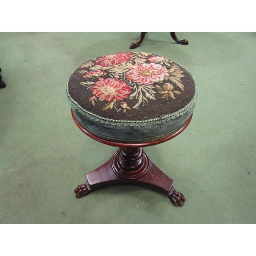 4049 - A circa 1840 mahogany circular seat stool with needlepoint upholstery over a chamfered bulbous colum... 