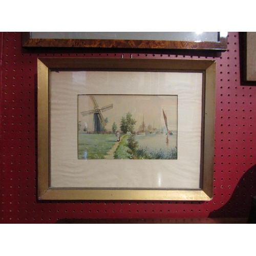 4088 - D.HEWHOUSE: A framed and glazed watercolour, Broads riverside path with figure and mill.  Signed and... 