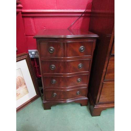 4117 - A George III style crossbanded flame mahogany serpentine front chest of small proportions the four d... 