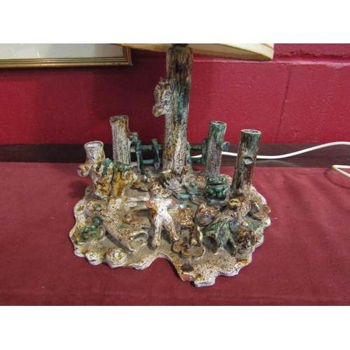 4140 - A Sheringham Pottery table lamp base as a figure and animals beside pond, a/f   (E) £10-15 or Group