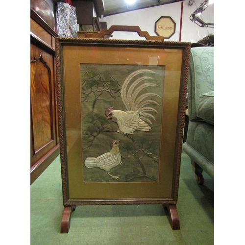 4149 - A Chinese silk and silver thread picture depicting a pair of chickens in later fire screen   (R) £50