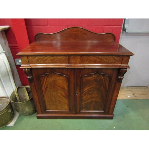 4155 - A circa 1840 flame mahogany chiffonier, the raised serpentine upstand over two frieze drawers and tw... 