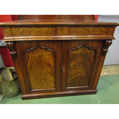 4155 - A circa 1840 flame mahogany chiffonier, the raised serpentine upstand over two frieze drawers and tw... 