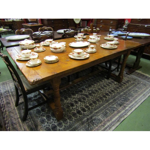 4160 - A 17th Century revival pegged oak plank top refectory dining table with cleated ends over cannon bar... 