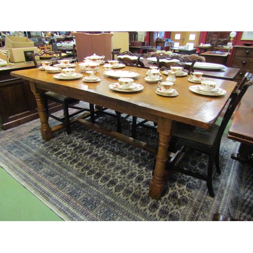 4160 - A 17th Century revival pegged oak plank top refectory dining table with cleated ends over cannon bar... 