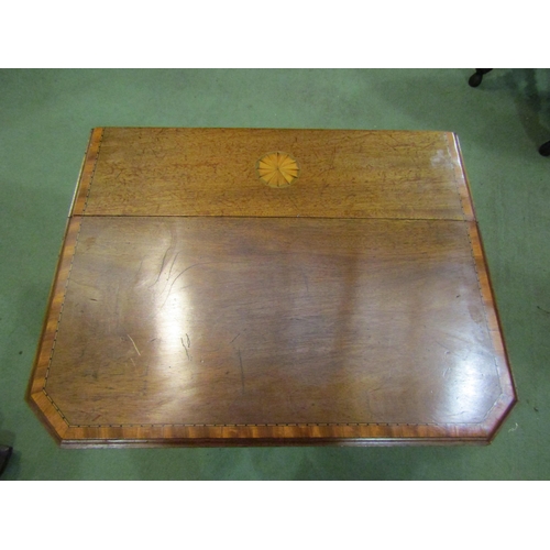 4210 - An Edwardian crossbanded mahogany canted corner Sutherland table with central fan paterae inlay, the... 