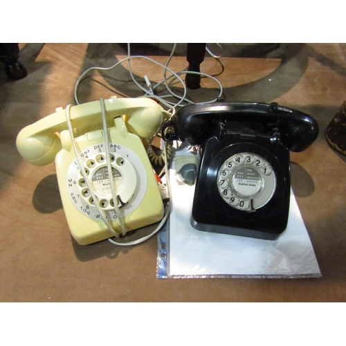 4216 - Two telephones 706 in black and ivory 1961 and 1966