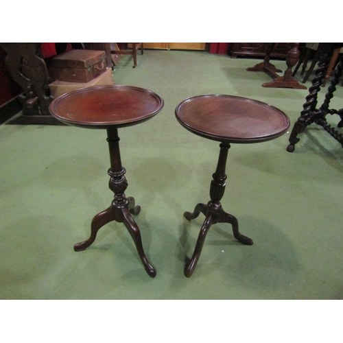 4221 - A near pair of mahogany wine tables, one tripod melon fluted details, the other tripod swirl detail,... 