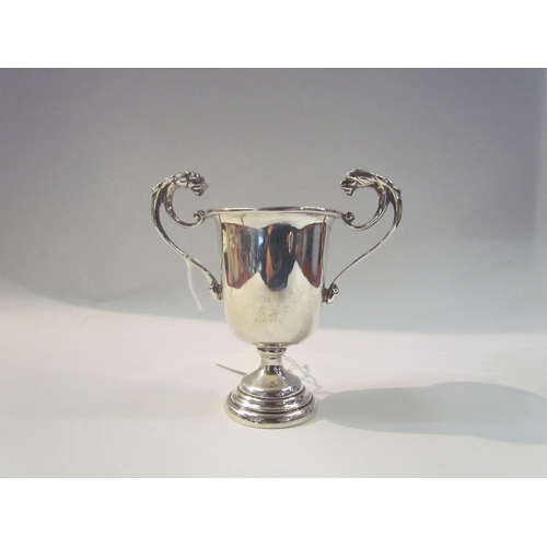 4328 - A Turner and Simpson silver twin handled trophy with lion mask detail, Birmingham 1938, 9cm tall, 60... 