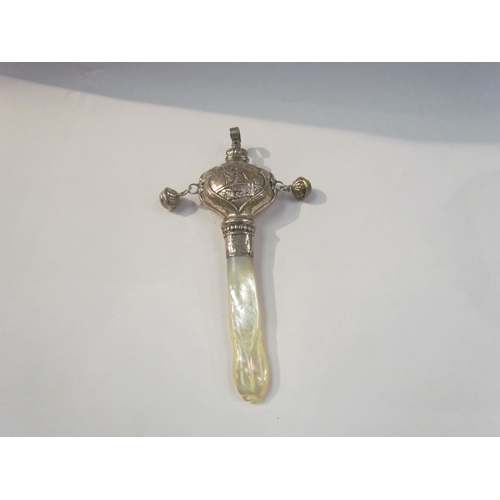 4345 - A Victorian silver baby's rattle with mother-of-pearl handle