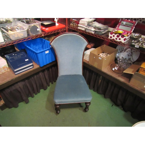 4002 - A blue upholstered chair on castors    (R) £30