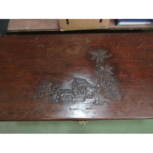 4003 - An Oriental carved camphor wood chest, 100cm wide x 49cm deep x 56cm tall