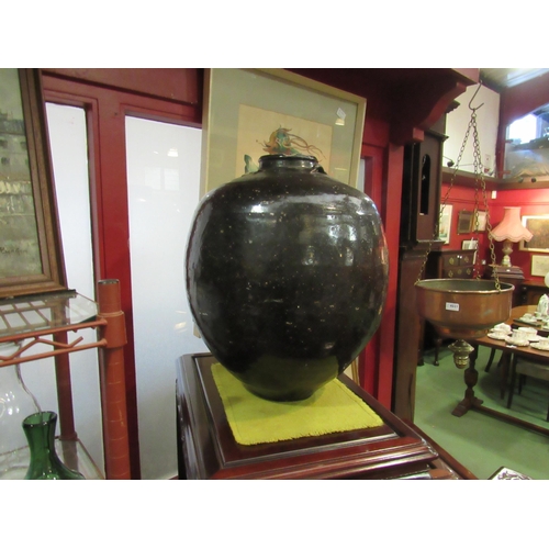 4012 - A Chinese salt glazed bulbous form vase of large proportions, 45cm tall