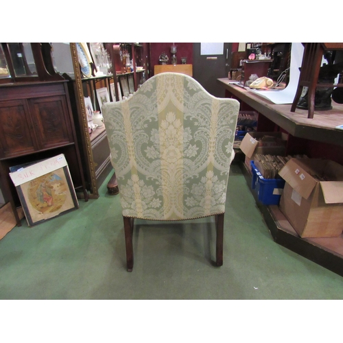 4174 - An early 19th Century inlaid mahogany Gainsborough armchair on brass castors