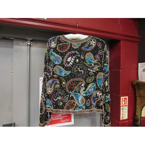 4175 - A 1980's Frank Usher paisley sequinned evening jacket