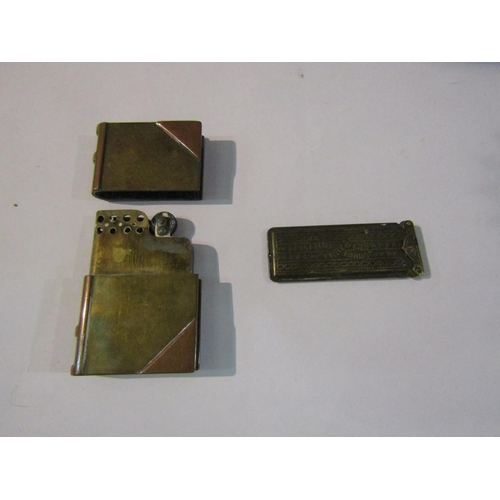 4395 - A brass book form light and match vesta