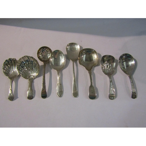 4398 - Seven silver caddy spoons to include shell shaped and a white metal example  (8)