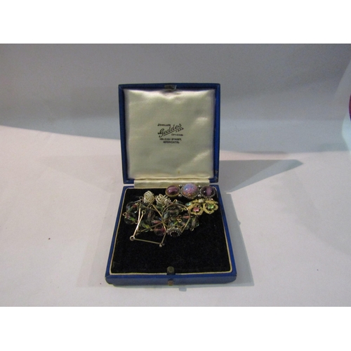 4402 - An aurora borealis necklace, a miracle brooch with another, a pair of 925 silver knot earrings and a... 