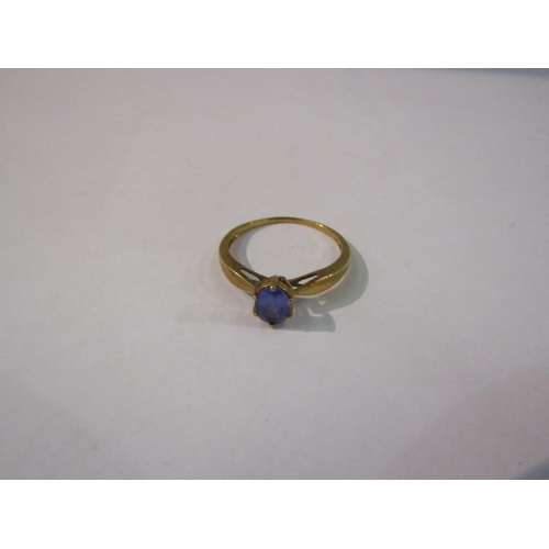 4420 - A 9ct gold ring set with an oval blue stone. Size S, 1.8g   (R) £20