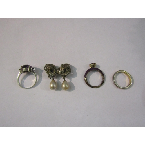 4514 - A costume ring stamped 925, two other costume rings and a pair of clip-on earrings   (E) £10-15