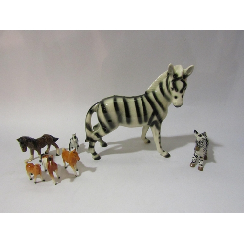 4270 - A Szeiler small Zebra, similar large Zebra and a selection of five small ceramic horses