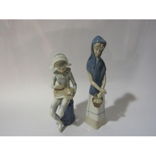 4280 - A Nao harlequin with cat 23cm tall, together with another unmarked figure of a girl with basket