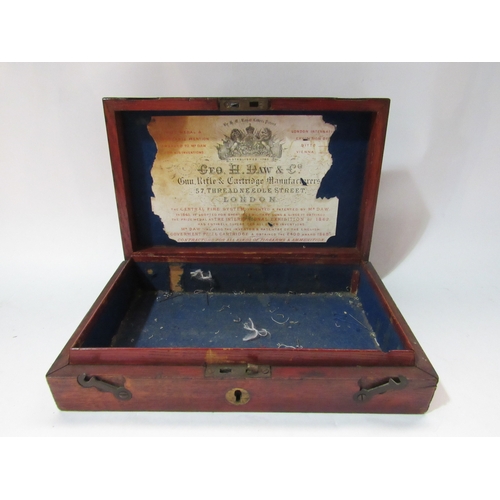 4297 - A George H. Daw & Co. pistol case, with original label to interior