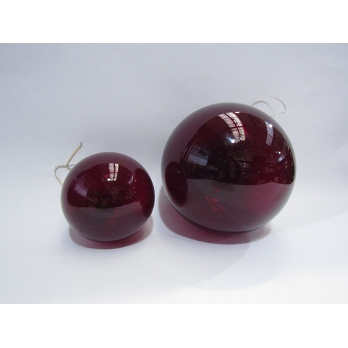 4486 - Two large red glass baubles