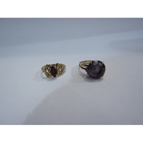 4337 - Two gold rings, one marked 9ct gold, each set with a purple colour stone, 7.1g