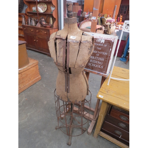 2030 - A 19th Century female mannequin with expanding strap iron skirt frame, Acme Collapsle   (R) £140