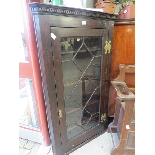 2177 - A 19th Century oak and astragal glazed corner cupboard