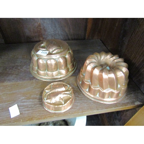 2168 - Three copper jelly moulds