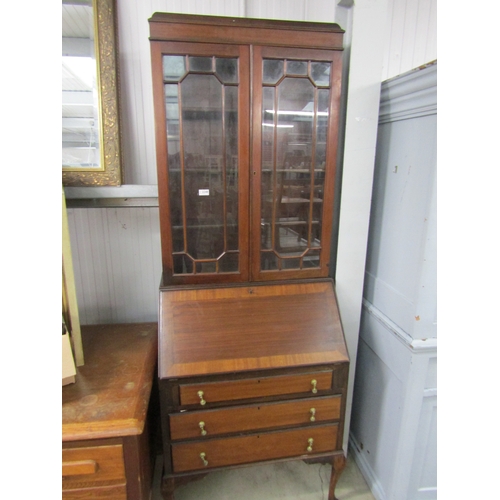 2263 - An Edwardian mahogany bureau bookcase on cabriole legs