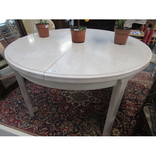 2306 - A limed oak extending dining table