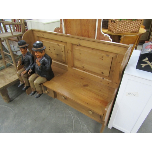 2288 - A waxed pine bench seat with two drawers 130cm wide