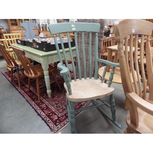 2320 - A painted pine slat back rocking chair