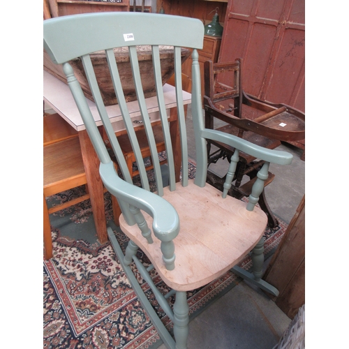 2320 - A painted pine slat back rocking chair