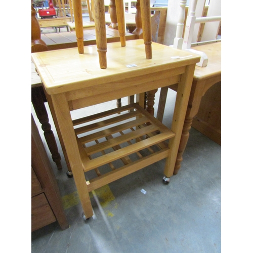 2316 - A small beech kitchen island with wine rack base