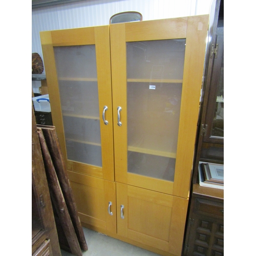 2356 - A modern beech four door cupboard     (E) £15-25