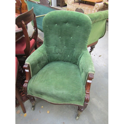 2450 - A Victorian mahogany button-back armchair, green velour upholstery   (E)  £8-12