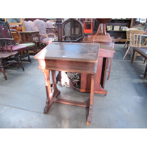 2230 - An oak lift top school desk