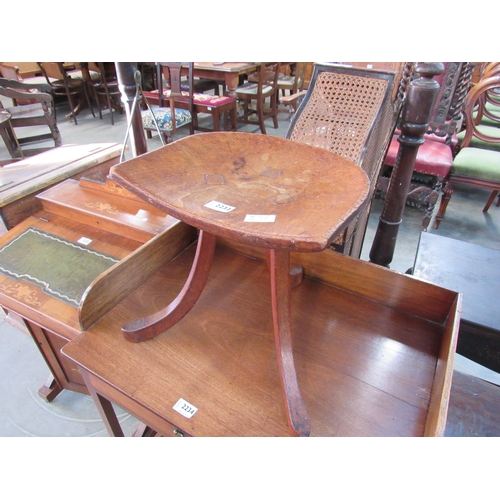 2233 - A 19th Century elm stool with shaped seat and splayed legs