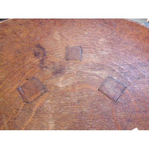 2233 - A 19th Century elm stool with shaped seat and splayed legs